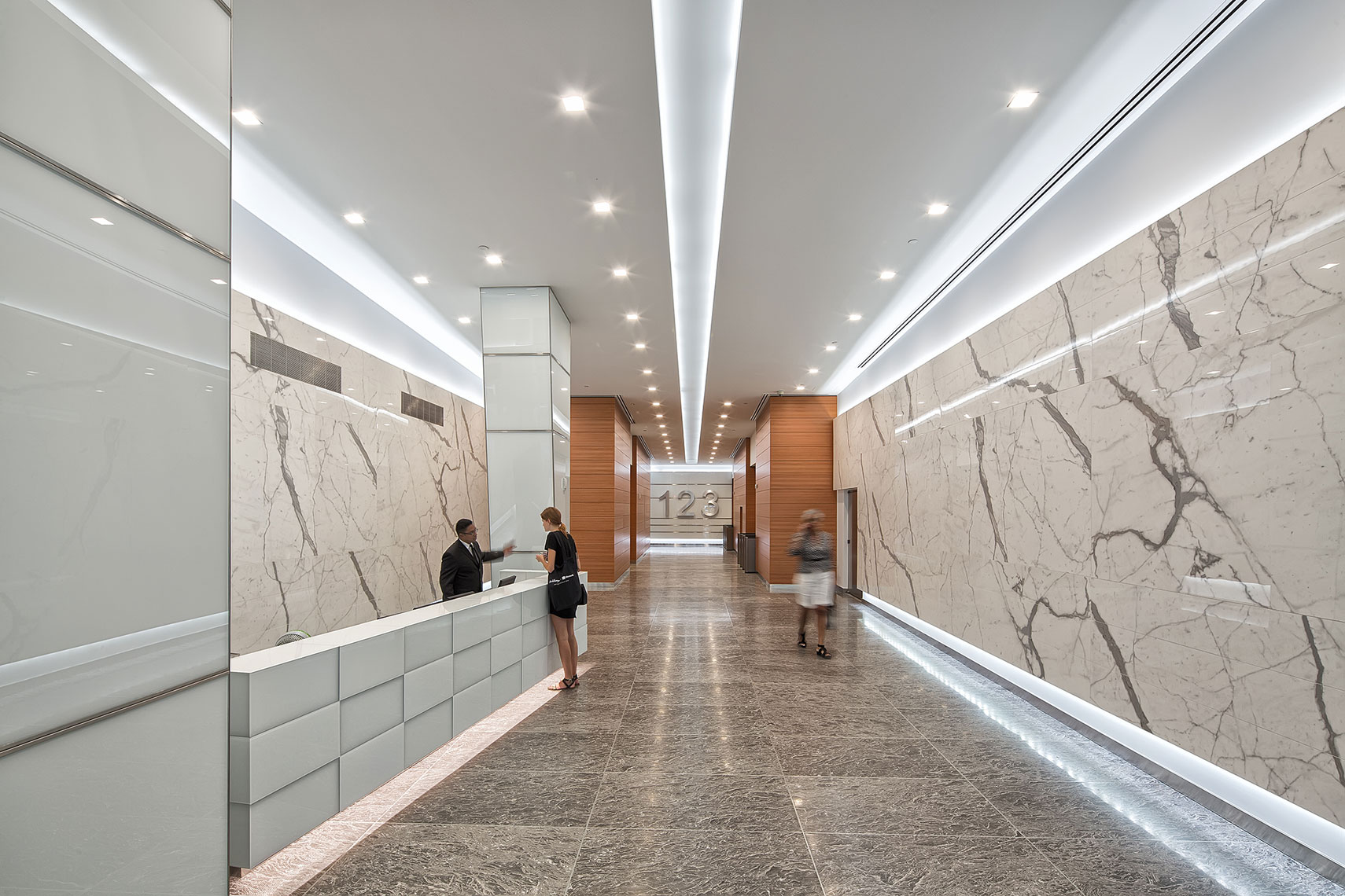 The stone work is stunning in this modern lobby. Architectural photographer NY.  
